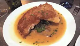  ?? DOMINIC ARMATO/THE REPUBLIC ?? Roast half Jidori chicken with Swiss chard, wild mushrooms and Madeira jus at Hush Public House in Phoenix.