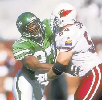  ?? 1996 GETTY IMAGES PHOTO
Marvin Washington, left, can see a day when CTE tests are standard. ??