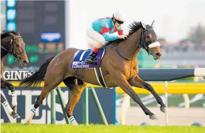  ?? Photo / Getty Images ?? Almond Eye races clear of a top-class field to win the Japan Cup.