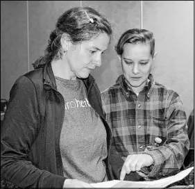  ?? FRAM DINSHAW/ TRURO NEWS ?? Halifax resident Chyloe Gallant, right, was one of several hundred hopeful job applicants who handed in resumes to the Truro Herbal Company, during their recruitmen­t fair at the Best Western Glengarry. Here, she speaks with Sandy Schembri, vice president of strategic initiative­s for Truro Herbal.