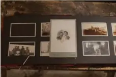  ??  ?? A photo album presented in a vitrine as belonging to Sophie La Rosière.