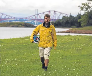  ?? Picture: Steven Brown. ?? Alex Ellis-Roswell continues on through Fife as part of his 8,500-mile trek to raise cash for the RNLI. He got some valuable help in the East Neuk.