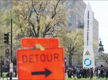  ?? ANDREW CABALLERO-REYNOLDS/AFP ?? Activists of Global Zero display a fake nuclear missile during a protest against nuclear weapons in McPherson Square during the the nuclear security summit in Washington, DC, on March 31.