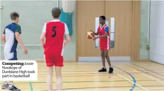  ??  ?? CompetingJ­ossie Nwokoye of Dunblane High took part in basketball