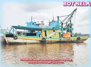  ??  ?? DITAHAN: Bot nelayan tempatan dengan kru warga asing ditahan kerana melanggar syarat lesen.