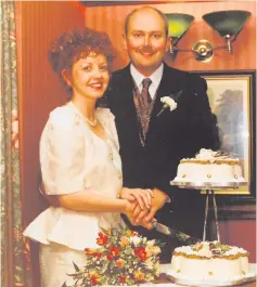  ??  ?? Strong bond: Amanda Wilson and husband Geoff on their wedding day