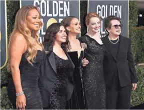  ??  ?? Mariah Carey, America Ferrera, Natalie Portman, Emma Stone and Billie Jean King stood in solidarity on the red carpet. DAN MACMEDAN/USA TODAY