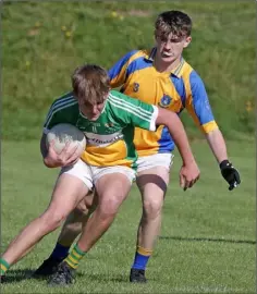  ??  ?? Joshua Doyle of Duffry Rovers shields the ball from Shane Codd (Taghmon-Camross).