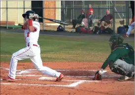  ?? LARRY GREESON / For the Calhoun Times ?? Sonoravill­e’s Gavin Phillips (2) takes a swing during Thursday’s Region 6-AAA contest against Adairsvill­e.