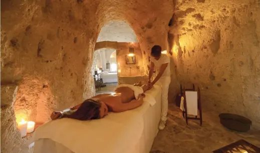  ??  ?? ABOVE: Step into a 9,000-year-old cave home at Le Grotte della Civita in Matera, Italy. Sextantio BELOW: Observe polar bears from the Tundra Buggy Lodge in Churchill, Manitoba. Daniel J. Cox