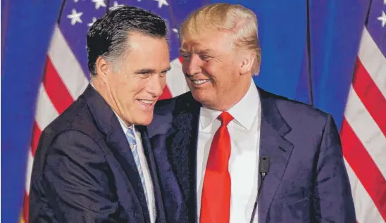  ?? JULIE JACOBSON/ AP ?? Mitt Romney and Donald Trump on Feb. 2, 2012, while Romney was campaignin­g for the Republican nomination for president.