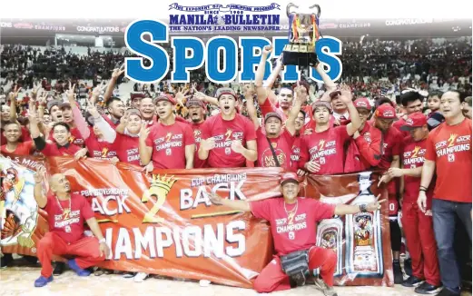  ??  ?? Players and officials of Barangay Ginebra San Miguel celebrate before a record crowd of 54,086 fans after capturing the PBA Governors’ Cup crown with a 101-96 victory over Meralco in Game 7 of their finals series Friday at the Philippine Arena in...