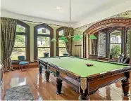  ?? NEW ZEALAND SOTHEBY’S INTERNATIO­NAL REALTY ?? The castle boasts five bathrooms, one of which is seen at left, and a library/billiard room.