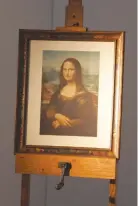  ??  ?? L.H.O.O.Q, a moustachio­ed Mona Lisa (La Joconde) by dadaist painter Marcel Duchamp painted in 1930, is displayed at the Center Pompidou National Museum of Modern Art in this photo taken on June 2, 2005.