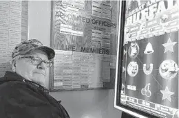  ?? JAMES MACPHERSON/AP 2021 ?? North Dakota regulators want to make clear where electronic pull tab machines will be allowed. Above, Louis Ressler plays a machine in Bismarck.