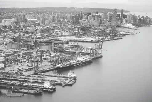  ?? JASON PAYNE / POSTMEDIA NEWS FILES ?? The Port of Vancouver posted record volume last year, with 142.1 million tonnes of cargo worth around $200 billion traded through it.
