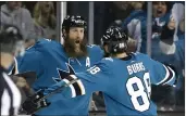  ?? JOSIE LEPE — BAY AREA NEWS GROUP, FILE ?? Former Shark Joe Thornton celebrates with Brent Burns (88) during their 2017 game at SAP Center in San Jose.