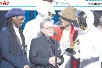  ?? — AFP file photo ?? Photo show (left) musicians Nile Rodgers, Thomas Bangalter of Daft Punk, Paul Williams, Pharrell Williams, and GuyManuel De Homem-Christo of Daft Punk accept the Album of the Year award for ‘Random Access Memories’ onstage during the 56th GRAMMY Awards at Staples Center in Los Angeles, California.