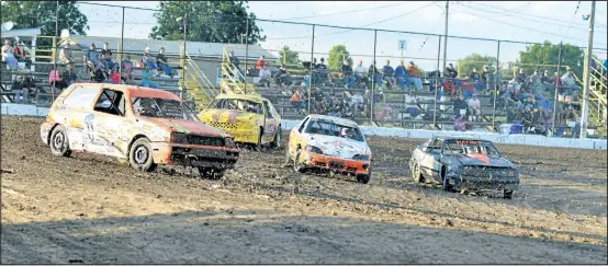  ?? BERND FRANKE/ POSTMEDIA NETWORK ?? Four-cylinder mini stock action at Merrittvil­le Speedway where the Triple Crown Series wraps up Saturday night.