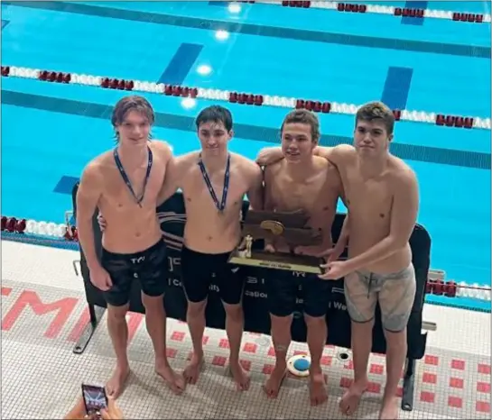  ?? COURTESY PHOTO ?? Among those helping the Westford Academy boys swim team capture the Division 1state championsh­ip in Cambridge were, from left, Brian Hall, Aedan Curtin, Quinn Schwab and Oliver Yorke.