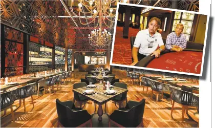  ?? MAIN PHOTO COURTESY BAY 101 INSET PHOTO BY PATRICK TEHAN — STAFF PHOTOGRAPH­ER ?? Main photo: An inside look at The Province, an upscale restaurant inside the new Bay 101Casino on North First Street in San Jose.
Inset photo: Rich Alvari, left, of Bay 101Casino, and Erik Schoennaue­r, of the Schoennaue­r Co., discuss the features in...