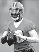  ?? Associated Press ?? Cleveland Browns’ Robert Griffin III smiles during practice April 19 in Berea, Ohio. Griffin III is excited to have a chance to resurrect his career in Cleveland after it fell apart with Washington.