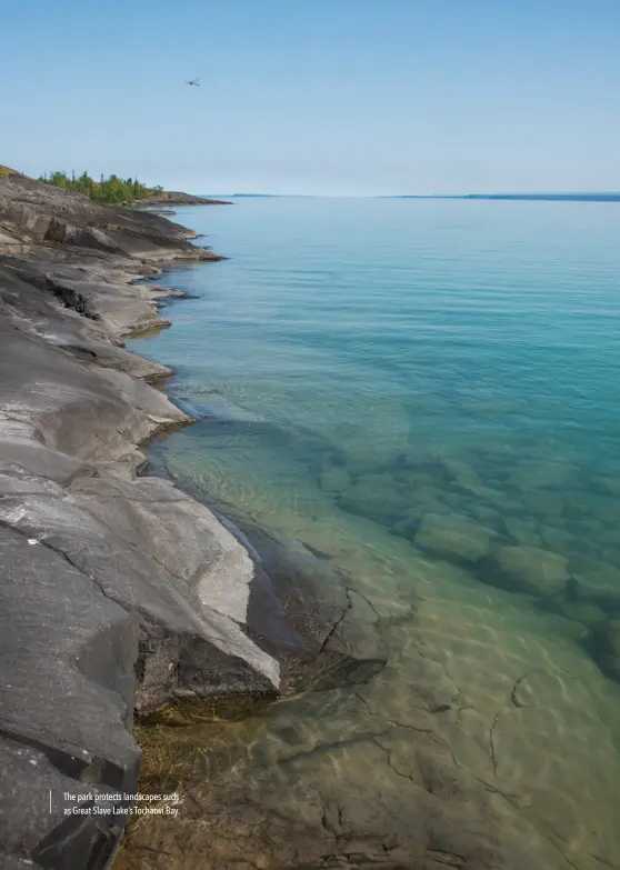  ??  ?? The park protects landscapes such as Great Slave Lake’s Tochatwi Bay.