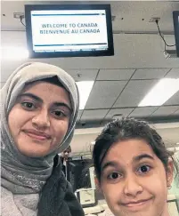  ?? BARIS FAMILY ?? Duygu Baris’ two daughters, Zeynep, 16, and Hatice, 9, are shown on arrival at Pearson airport this week.