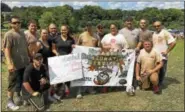  ?? CONTRIBUTE­D PHOTO ?? Disaster Relocation Services, based in Middletown, recently made a donation to the Epilepsy Foundation. Employees participat­ed in the foundation’s annual mud volleyball tournament and donated the proceeds.
