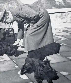  ??  ?? Secret love:
Eva Braun, above, who married Hitler the day before they killed themselves, was unknown to the German people. Top left, Hitler was best man at the wedding of Martin and Gerda Bormann. Right, Joseph Goebbels and his wife Magda, with their stepson and six children. Left, Carin Goering