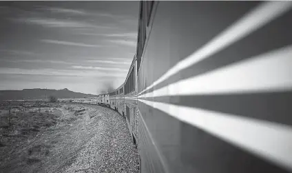  ?? Luke Sharrett, © The New York Times Co. ?? An Amtrak train travels near Delhi, in northern Las Animas County, in April. Amtrak has a goal of expanding passenger train service significan­tly nationwide by 2035.