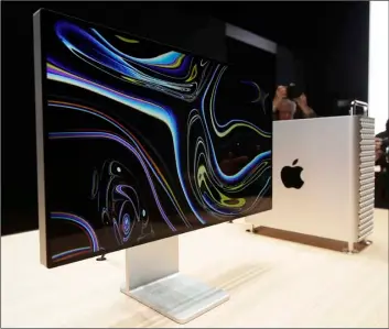  ??  ?? In this June 3 file photo a monitor of the Mac Pro is shown in the display room at the Apple Worldwide Developers Conference in San Jose, Calif.
AP Photo/Jeff ChIu