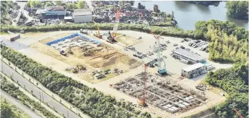  ??  ?? An aerial view shows the site where Kake Educationa­l Institutio­n is scheduled to build a new veterinary department of a private university, in Imabari, Ehime Prefecture, Japan, in this photo taken by Kyodo. — Reuters photo