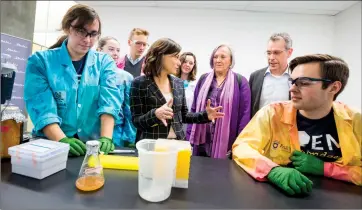  ?? @IMartensHe­rald Herald photo by Ian Martens ?? Lethbridge MLAs Shannon Phillips and Maria Fitzpatric­k meet with professor Hans-Joachim Wieden and iGem students Kristi Turton and Lucas Saville Wednesday during a tour of the new Destinatio­n Project Science and Academic building at the University of Lethbridge.