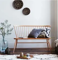  ??  ?? Above left Ercol Originals loveseat, £679, Furniture Village. For a similar rug, try the Tekouma Berber-style hand-woven rug, £285, La Redoute