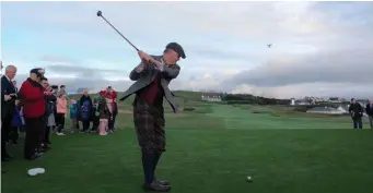  ??  ?? Captain Kevin Flanagan tees off.