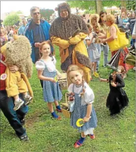  ?? PHOTOS BY JOHN HAEGER @ ONEIDAPHOT­O ON TWITTER/ ONEIDA DAILY DISPATCH ?? Carlee Vanderwerk­en, then- 6, Natalie Vanderwerk­en, then- 4, both of Oneida, and Courtney Hitchcock, then- 3, of Eagle Bay, along with others, wait to be judged during the costume contest in Chittenang­o on June 2, 2012.