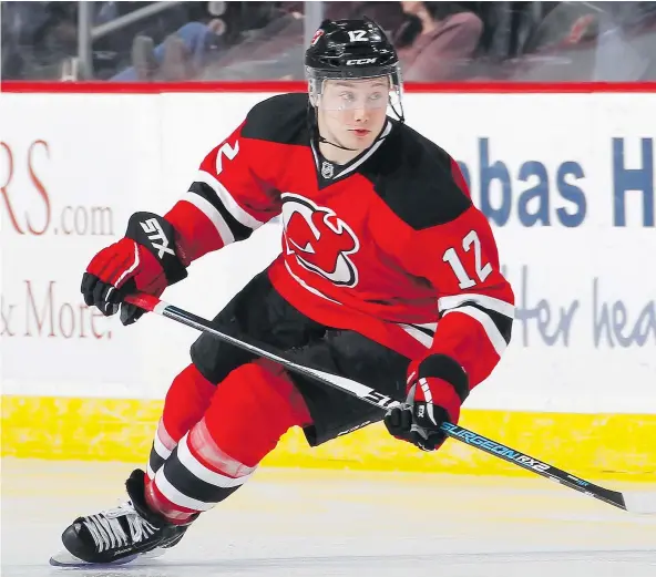  ?? — GETTY IMAGES FILES ?? The New Jersey Devils tried to send Reid Boucher to the minors to get more ice time but he was claimed off waivers by the Canucks. The left winger has a booming shot and scoring ability but lacks in the defensive aspect of the game.