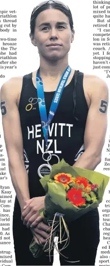 ?? PHOTO: GETTY IMAGES ?? Happier times . . . Andrea Hewitt stands on the podium after finishing second in an ITU World Triathlon race in Stockholm, Sweden, in 2014.