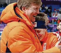  ?? [VADIM GHIRDA/THE ASSOCIATED PRESS] ?? Wust is hugged by Dutch King Willem-Alexander after he victory on Monday.