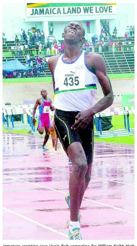  ?? IAN ALLEN/PHOTOGRAPH­ER ?? Jamaican sprinting icon Usain Bolt competing for William Knibb High School during the 2003 Champs.