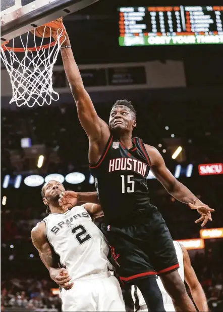  ?? Karen Warren / Houston Chronicle ?? Whether it was outside with 22 3-pointers or center Clint Capela going 8 of 10 from close range while scoring 20 points, the Rockets had their way with Kawhi Leonard (2) and the Spurs on Monday night.