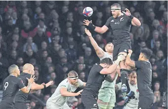  ??  ?? New Zealand’s Kieran Read, top, wins the line-out ball during the match against England last year.