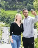  ?? PHOTO: CHRISTINE O’CONNOR ?? Photo opp at the top . . . Kim Weyenberg (left) and Jordan Christians­en capture the moment atop Dunedin’s Baldwin St, the world’s steepest street.