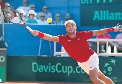  ?? AP ?? Croatia’s Borna Coric returns a shot to Frances Tiafoe of the US during their Davis Cup semifinal singles match. —