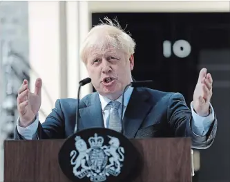  ?? FRANK AUGSTEIN THE ASSOCIATED PRESS ?? British Prime Minister Boris Johnson promised a Brexit by Halloween, “no ifs or buts,” after being sworn in.