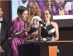  ?? KEVIN WINTER/GETTY IMAGES ?? Isabella Rossellini translates for Italian director Lina Wertmüller, who won an honorary Oscar at the Governors Awards on Oct. 27.