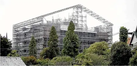  ?? ANDY JACKSON/STUFF ?? New Plymouth Council is under wraps as they spend $1m on a new roof.