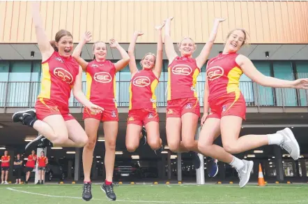  ?? Picture: RICHARD GOSLING ?? Suns players Maddy Watt, Charlotte Hammonds, Dee Heslop, Serene Watson and Georgia Eller react to the news that the club will have a team in the AFLW from 2020.