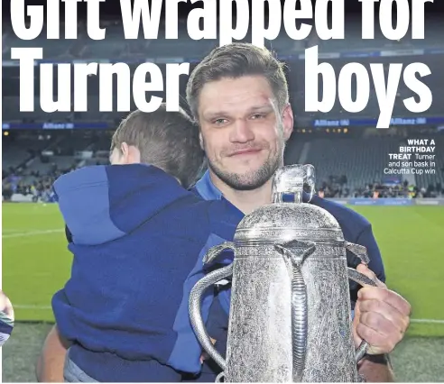  ?? ?? WHAT A BIRTHDAY TREAT Turner and son bask in Calcutta Cup win